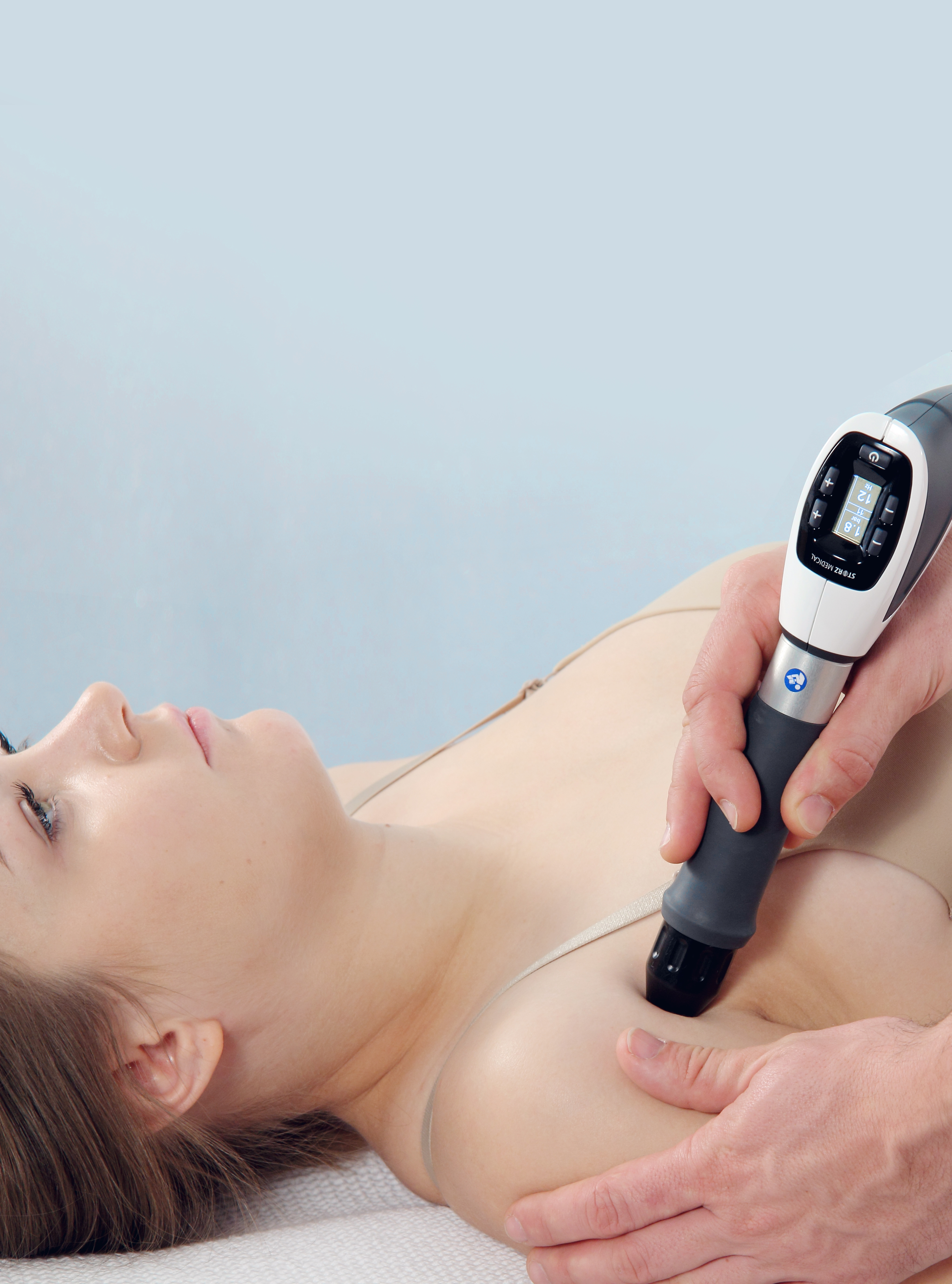 Woman having Shockwave treatment