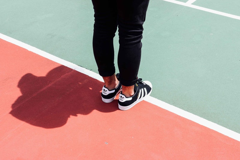 Standing in trainers